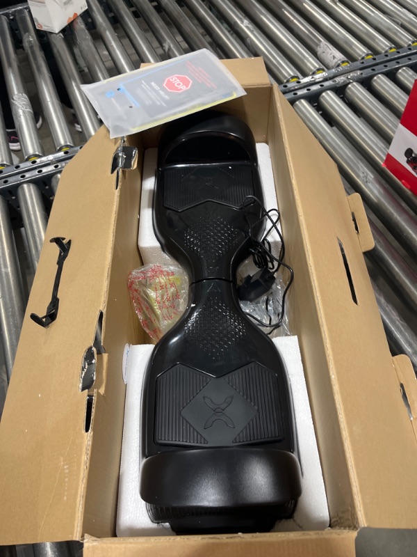 Photo 2 of Hover-1 Helix Electric Hoverboard | 7MPH Top Speed, 4 Mile Range, 6HR Full-Charge, Built-in Bluetooth Speaker, Rider Modes: Beginner to Expert Hoverboard Black