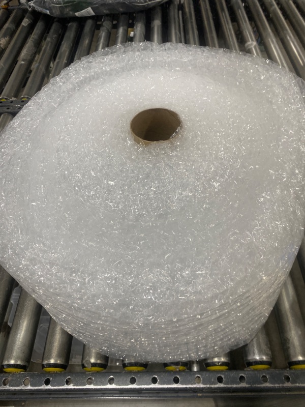 Photo 1 of Amazon Basics Perforated Bubble Cushioning Wrap - Medium 5/16", 12-Inch x 100-Foot Long Roll & Perforated Bubble Cushioning Wrap - Small 3/16", 12-Inch x 175-Foot Long Roll