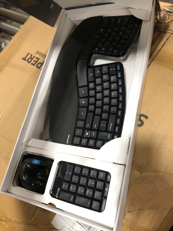 Photo 1 of Microsoft Sculpt Ergonomic Wireless Desktop Keyboard and Mouse - Black. Wireless , Comfortable, Ergonomic Keyboard and Mouse Combo with Split Design and Palm Rest.