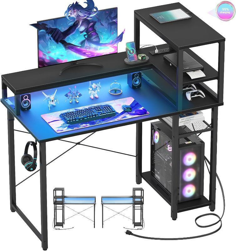 Photo 1 of Cyclysio Gaming Desk 39", Computer Desk with Reversible Storage Shelves, Home Office Desk with Power Outlets & RGB Led Lights, Small Desk for Gaming, Studying, Working Black
