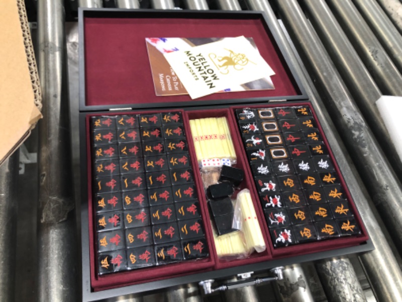 Photo 2 of Yellow Mountain Imports Chinese Mahjong Game Set, Jet Set - with 148 Black Tiles and Wooden Case, Wooden Spinner, Dice, and Scoring Sticks (for Chinese Style Game Play)