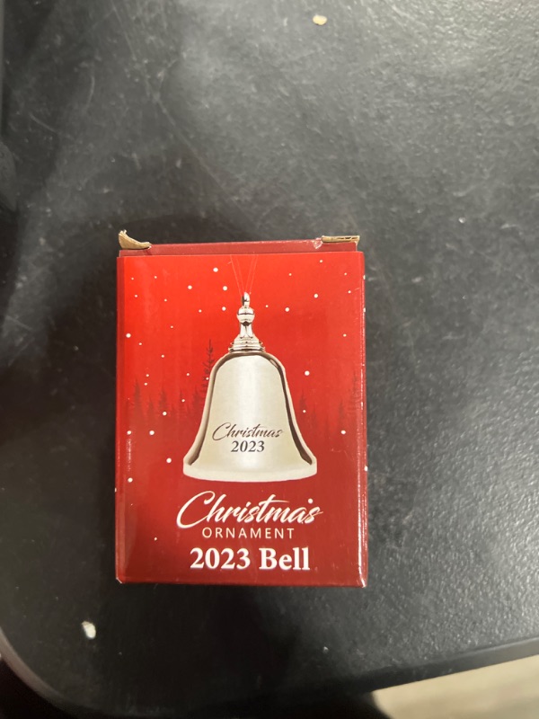 Photo 2 of 2023 Bell Christmas Ornament - Elegant Silver Ornament with Red Ribbon. It Makes a Pleasant Ringing Sound to Celebrate The Close of 2023