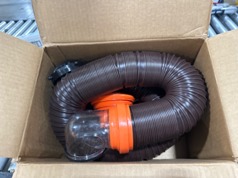 Photo 2 of Camco RhinoFLEX RV Sewer Hose Kit with Swivel Transparent Elbow and 4-in-1 Dump Station Fitting, Brown, 15 Feet (39770) 15ft Sewer Hose Kit Frustration-Free Packaging