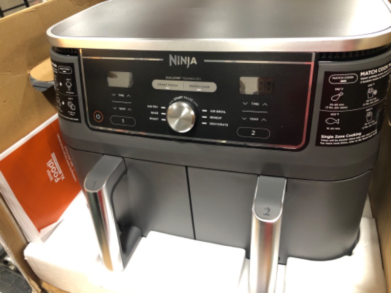 Photo 2 of Ninja DZ401 Foodi 10 Quart 6-in-1 DualZone XL 2-Basket Air Fryer with 2 Independent Frying Baskets, Match Cook & Smart Finish to Roast, Broil, Dehydrate & More for Quick, Easy Family-Sized Meals, Grey