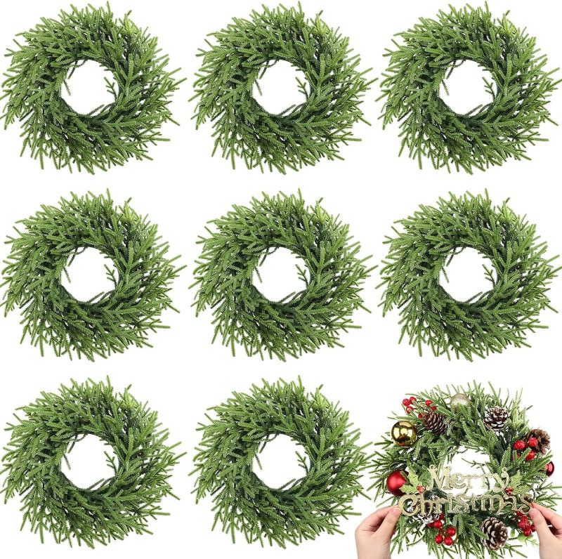 Photo 1 of  Zeyune 8 Pcs Christmas DIY Green Wreath 14 Inch Artificial Christmas Wreaths Faux Plain Wreaths for Decorating Front Door Window Room Farmhouse Christmas Party Indoor Outdoor (Stylish) 