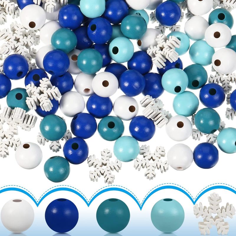 Photo 1 of 200 Pieces Christmas Wood Beads Round Ocean Colored Wooden Beads 0.63 Inch Loose Spacer Wooden Beads Ice Blue Beads Snowflake White Painted Bead for DIY Craft Garland Wreath Necklace Making Home Decor