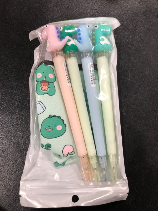 Photo 2 of G-Ahora 4PCS Dinosaur Gel Pen with Pencil Case Dinosaur Ballpoint Pens, Dinosaur Retractable Gel Pens, 0.5mm Black Ink Pen Office School Supplies Gifts for Boys Girls(PEN Dinosaur)