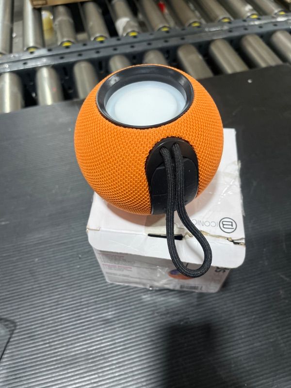 Photo 2 of Biconic Round Portable Bluetooth Speaker
