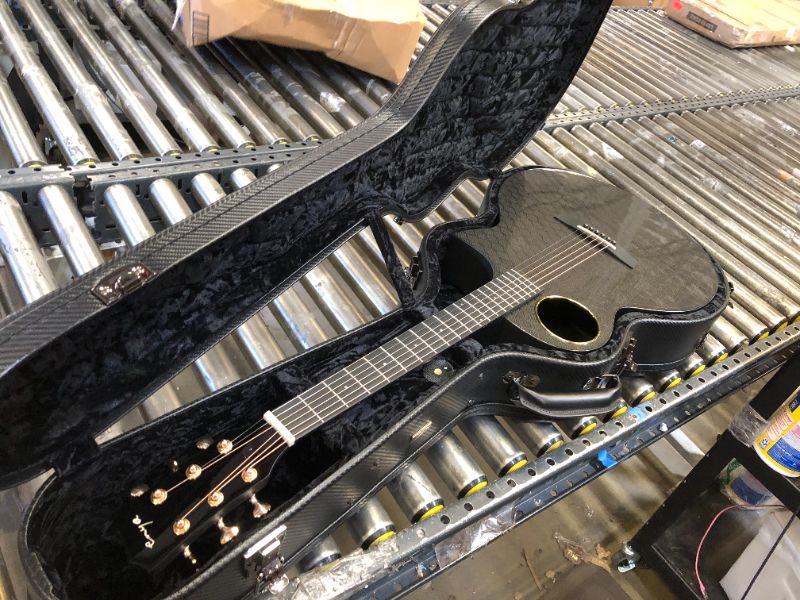Photo 2 of Enya Acoustic Electric Guitar Carbon Fiber X4 PRO AcousticPlus 41” 4/4 Sized Guitar Bundle with Hard Case, Leather Strap, Instrument Cable & USB Type-C Charging Cable(X4 PRO) 41” Black
