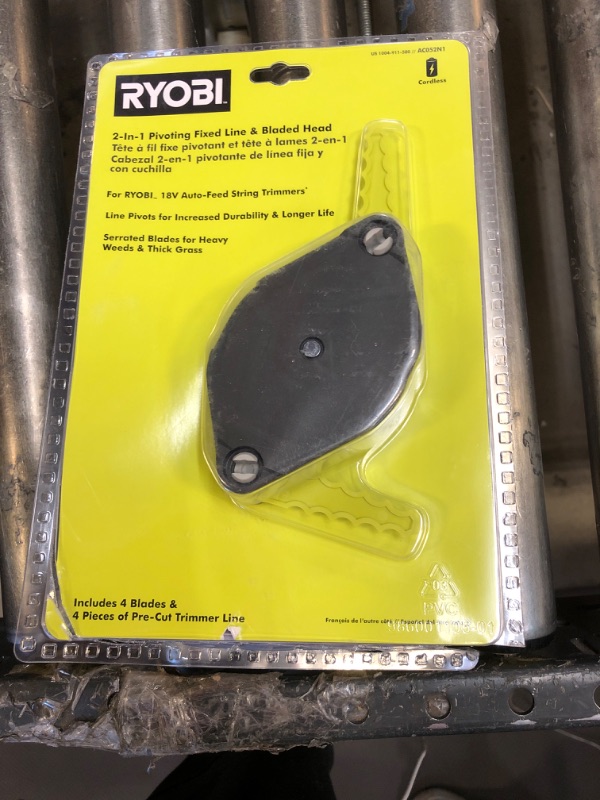 Photo 2 of Ryobi 2-in-1 Pivoting Fixed Line and Bladed Head AC052N1