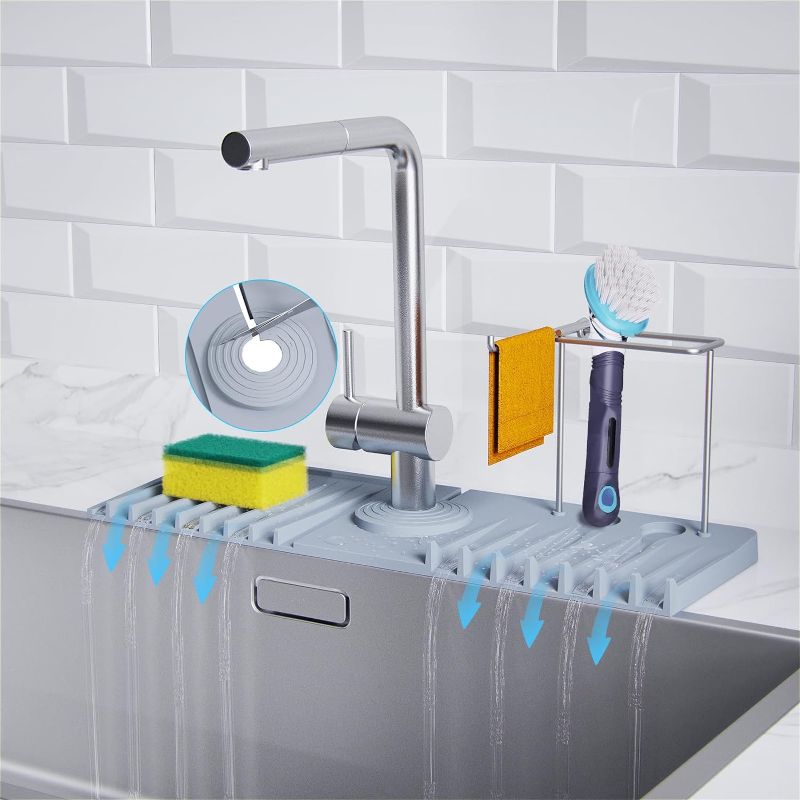 Photo 1 of Sink Splash Guard - 3 in 1 Silicone Faucet Mat for Kitchen with Stainless Steel Dish Cloth Hanger & Brush Holder, 5° Slope Design Silicone Draining Pad for Kitchen & Bathroom Sink Accessories
