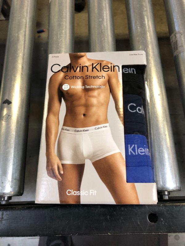 Photo 1 of Calvin Klein Men's Underwear Cotton Stretch 3-Pack Trunk Medium 1 Black, 1 Blue Shadow, 1 Cobalt Water