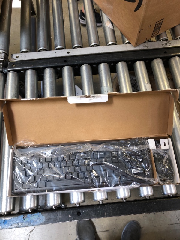 Photo 1 of Dell Wireless Keyboard and Mouse - KM3322W, Wireless - 2.4GHz, Optical LED Sensor, Mechanical Scroll, Anti-Fade Plunger Keys, 6 Multimedia Keys, Tilt Leg - Black