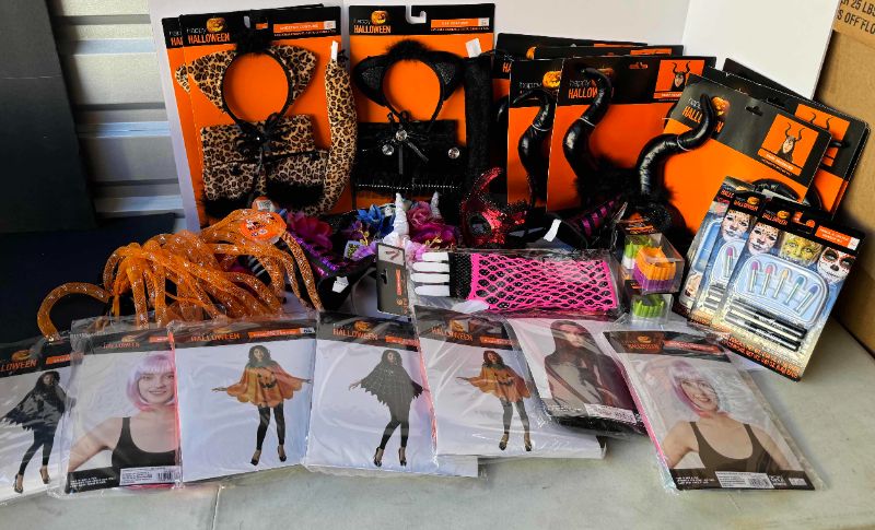 Photo 1 of HALLOWEEN COSTUMES, MASKS, HEAD BANDS AND MAKE UP ASSORTED LOT