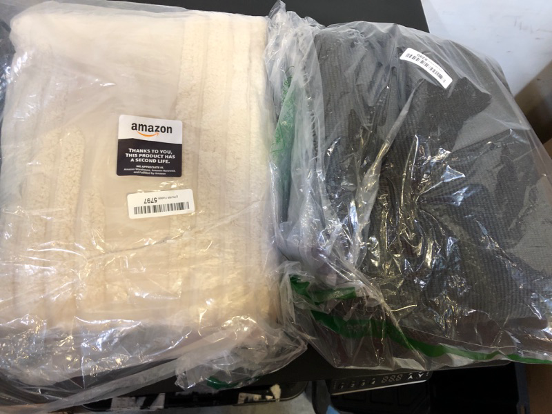 Photo 1 of BOX LOT OF 1 BLANKET BEIGE & 1 RUG BLACK , SIZES UNKNOWN