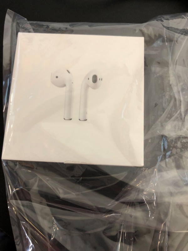 Photo 2 of Apple AirPods with Charging Case (Latest Model)