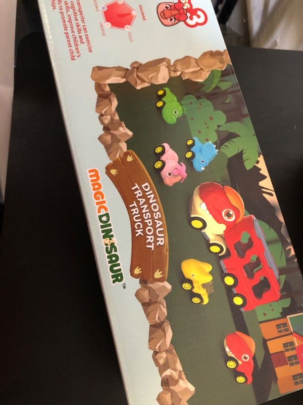 Photo 1 of Dinosaur Car Toys for Toddlers and Kids, Friction Cute Tyrannosaurus Transport Truck with 5 Cartoon Pull Back Dino Cars, 5 in 1 Dino Carrier Play Set for 2 3 4 5 6+ Year Old Boys & Girls 6 in 1 dino play set