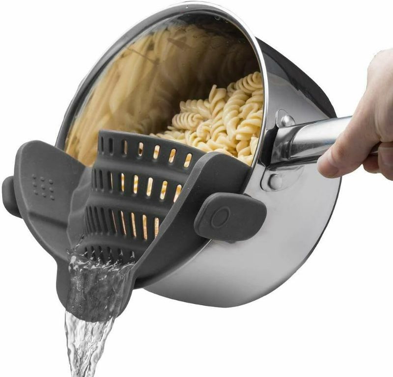 Photo 1 of KITCHEN GIZMO SNAP N' STRAIN - SILICONE CLIP-ON COLANDER, HEAT RESISTANT DRAINER FOR VEGETABLES AND PASTA NOODLES, KITCHEN GADGETS FOR BOWL, POTS, AND PANS - ESSENTIAL HOME COOKING TOOLS - GREY
