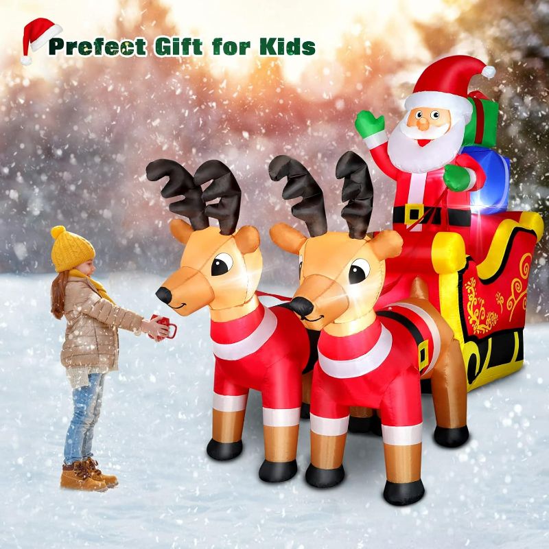 Photo 1 of (Built in Blower) Christmas Inflatables Santa Claus on Sleigh with 2 Reindeers Outdoor Yard Decoration, 7FT Blow up Santa Sleigh and Reindeer with Gift Boxes, Xmas Decor for Courtyard Garden Lawn, Built-in LED Lights