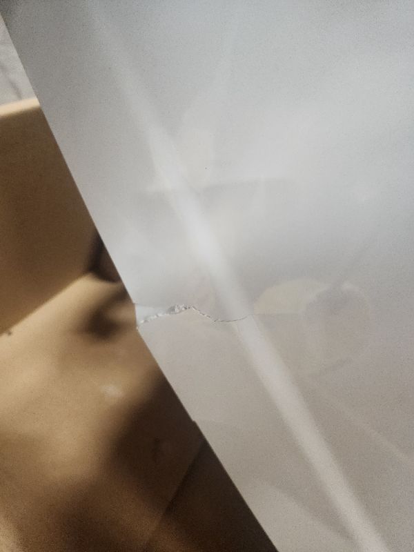 Photo 3 of American Standard Elevate 60×30 Curved Tub - Left Handed Drain - Cosmetic Damage -Apron Of Tub Has 2 Cracks Showing, 1 Small Crack On The Inside of Apron - Does Not Affect Function 
