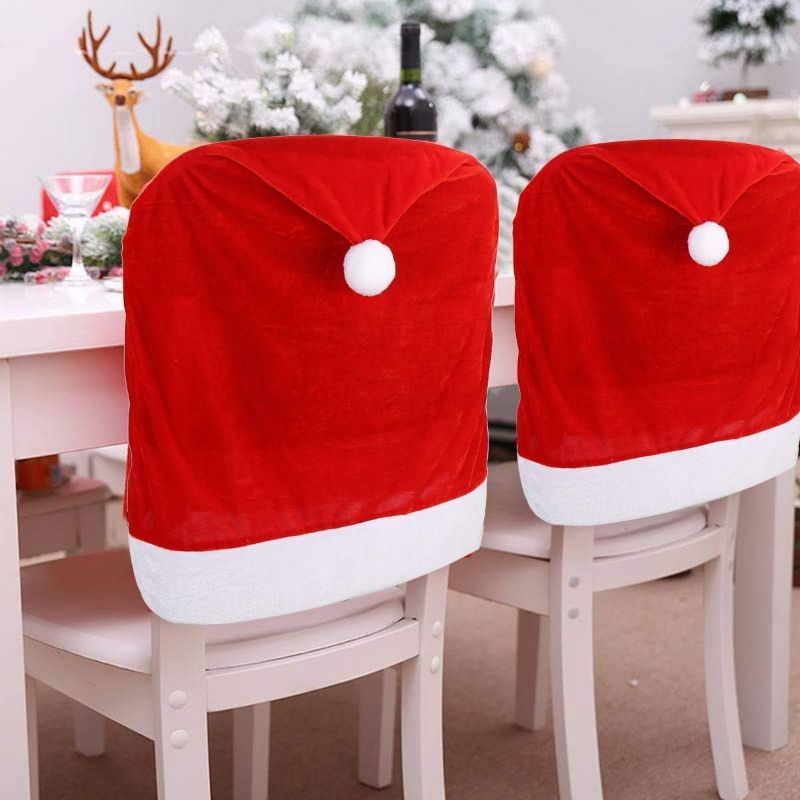 Photo 1 of CCINEE 6PCS Christmas Chair Covers, Santa Claus Hat Slipcover Xmas Chair Back Cover for Christmas Dinning Room Decoration