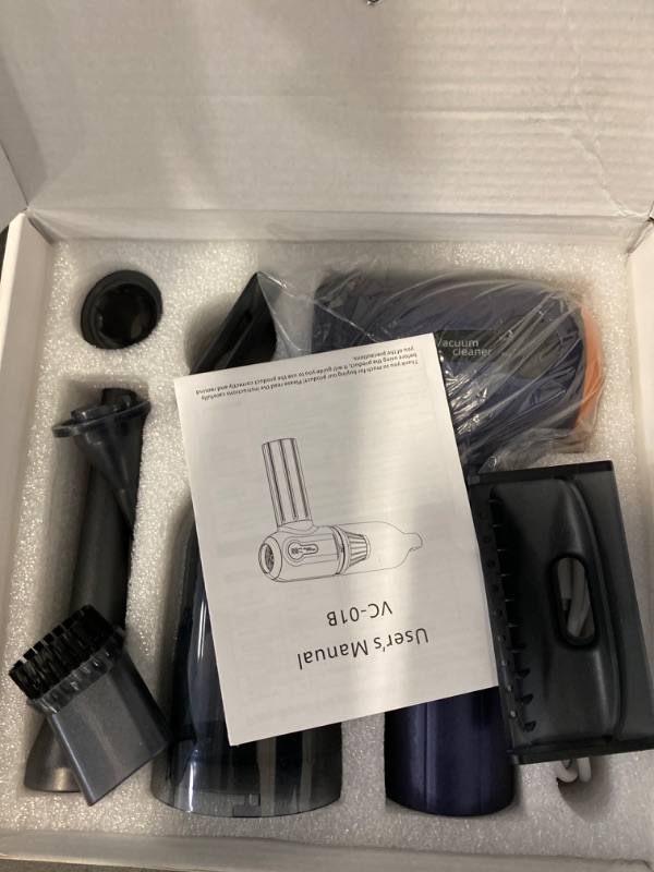 Photo 1 of Cordless Vacuum Cleaner with Fast Charging and Multiple Attachments Car Vacuum, 4-in-1 Design, Blue