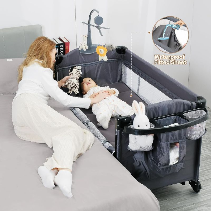 Photo 1 of 5 in 1 Baby Bassinet Bedside Sleeper, Pack and Play Bassinet with Diaper Changer and Waterproof Sheet, Mattress,Music,Folding Portable Playards from Newborn to Toddler,Grey