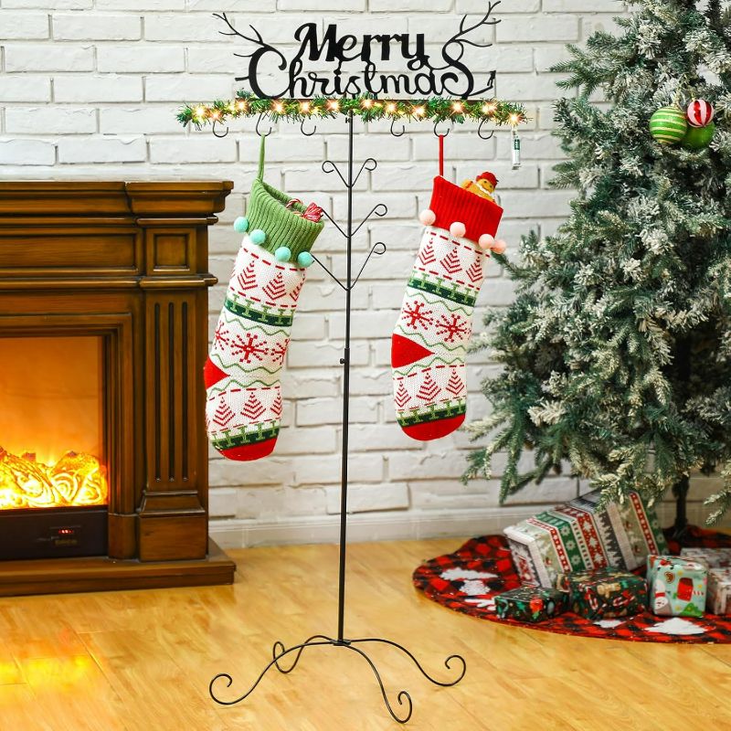 Photo 1 of Soaoo Christmas Stocking Holder Stand with 6 Non-Slip Hooks Christmas Stocking Stand Hangers Freestanding Metal Holder for Fireplace Living Room Decorations(Merry Christmas)