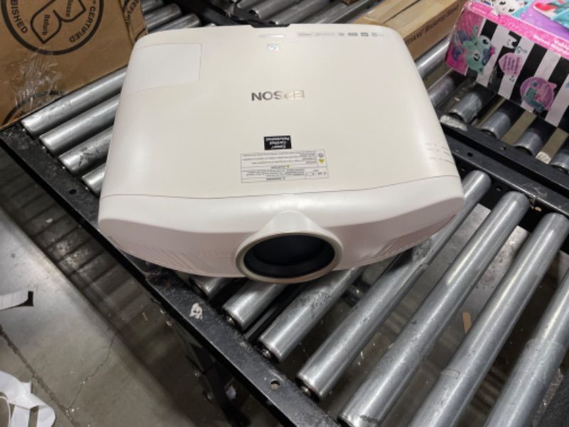 Photo 1 of EPSON HOME CINEMA 4010 4K PRO-UHD PROJECTOR WITH ADVANCED 3-CHIP DESIGN AND HDR WITH 100% BALANCED COLOR AND WHITE BRIGHTNESS AND ULTRA WIDE DCI-P3 COLOR GAMUT (V11H932020-N) (RENEWED) HC 4010 (RENEWED), ****for parts****
