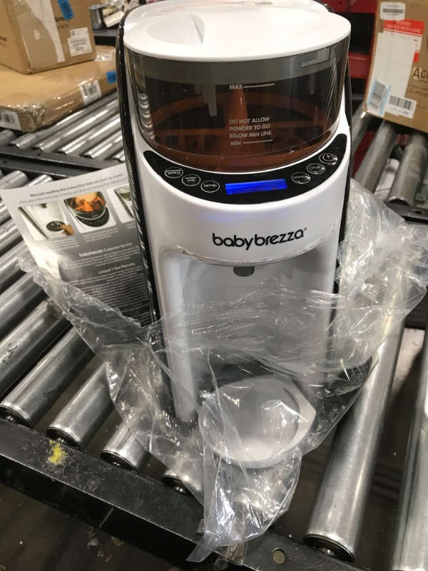 Photo 2 of Baby Brezza New and Improved Formula Pro Advanced Formula Dispenser Machine - Automatically Mix a Warm Formula Bottle Instantly - Easily Make Bottle with Automatic Powder Blending, White
