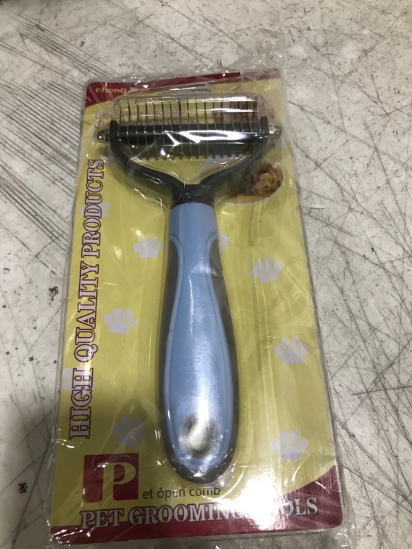 Photo 1 of Pet Brush, Pet Nail Clippers and Laser pointer.  