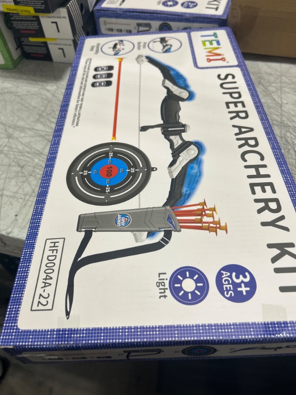 Photo 1 of TEMI Kids Bow and Arrow Set - LED Light Up Archery Toy Set with 10 Suction Cup Arrows, 4 Target & Quiver, Indoor and Outdoor Toys Archery Boys Toys Gifts for 3-12 Years Old Boys Girls Set - Blue