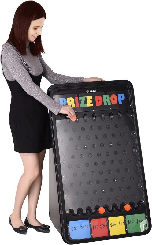 Photo 1 of WinSpin 41"x25" Prize Drop Board Foldable Stand Disk Drop Board Game with 12 Playing Pucks for Carnival Tradeshow Party Live Stream
