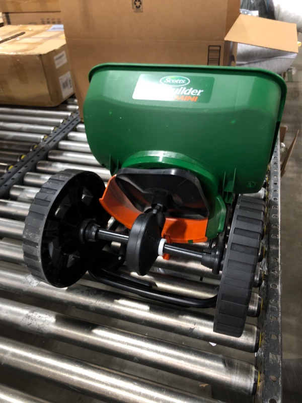 Photo 3 of Scotts Turf Builder EdgeGuard Mini Broadcast Spreader - Holds Up to 5,000 sq. ft. of Lawn Product, Green