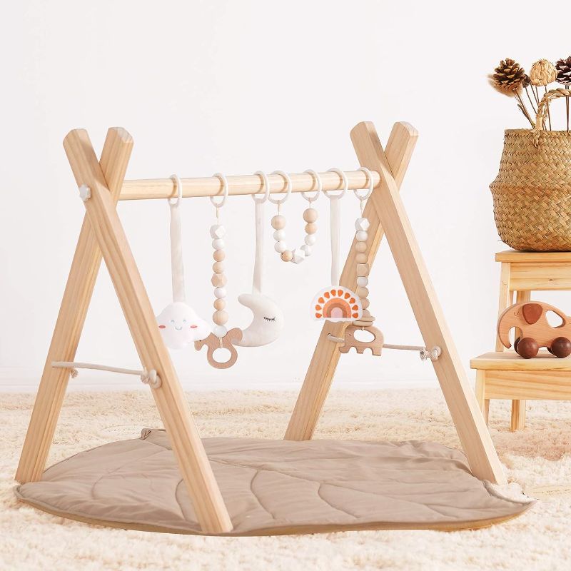 Photo 1 of little dove Baby Play Gym with Mat, Wooden Play Gym with 6 Gym Toys, Foldable Play Gym Frame, Infant Activity Gym Hanging Bar, Baby Developmental Toy Montessori
