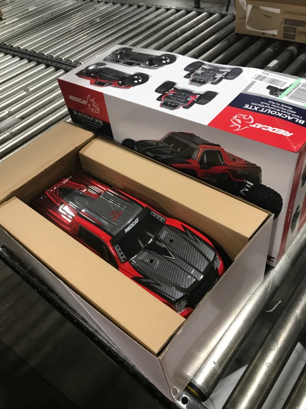 Photo 2 of Redcat Racing Blackout XTE 1/10 Scale Electric Monster Truck with Waterproof Electronics, Red