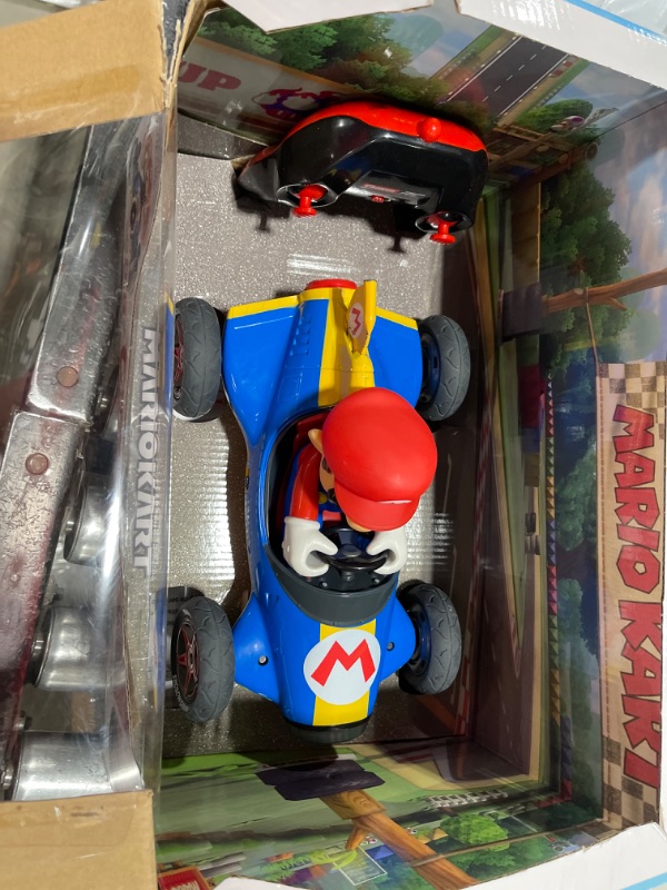 Photo 2 of Carrera 181066 RC Official Licensed Kart Mach 8 Mario 1: 18 Scale 2.4 Ghz Remote Radio Control Car with Rechargeable Lifepo4 Battery - Kids Toys Boys/Girls Mario Kart Mach 8 - Mario