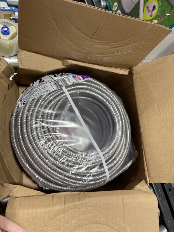 Photo 2 of Southwire 68579201 Armorlite Type Mc Aluminum Armored Cable, 14/2, 600 Volts, 250 Ft. Coil 250 ft 14/2 AWG