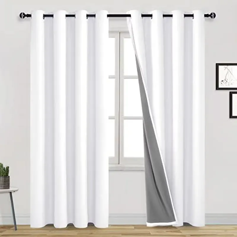 Photo 1 of  White Blackout Curtains 84 Inches Long for Living Room Thermal Insulated Light & Heat Blocking Full Room Darkening Noise Reducing Grommet 2 Panels Curtain (White,52"W x 84"L)
