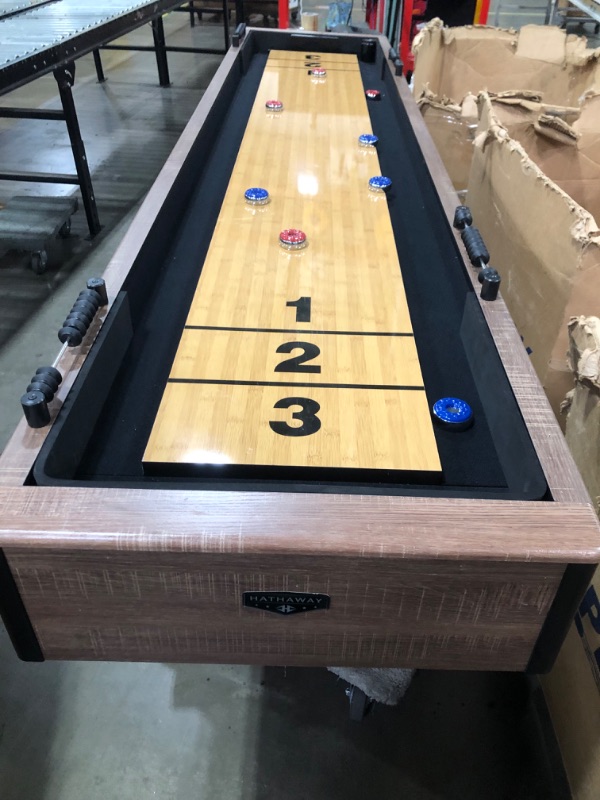 Photo 10 of (WILL NEED TRUCK)
Hathaway Excalibur 9-Ft Shuffleboard Table for Great for Family Recreation Game Rooms, Designed with a Rustic Driftwood Finish with Built-In Leg Levelers, Includes 8 Pucks, Table Brush and Wax
