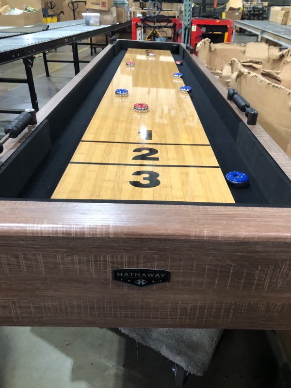 Photo 2 of (WILL NEED TRUCK)
Hathaway Excalibur 9-Ft Shuffleboard Table for Great for Family Recreation Game Rooms, Designed with a Rustic Driftwood Finish with Built-In Leg Levelers, Includes 8 Pucks, Table Brush and Wax
