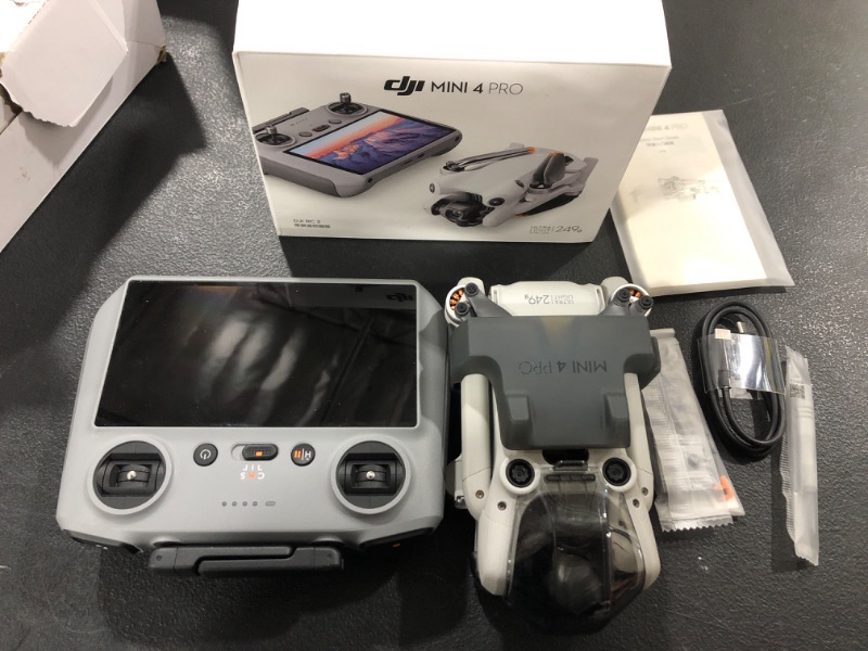 Photo 3 of DJI Mini 4 Pro Drone with RC 2 Controller