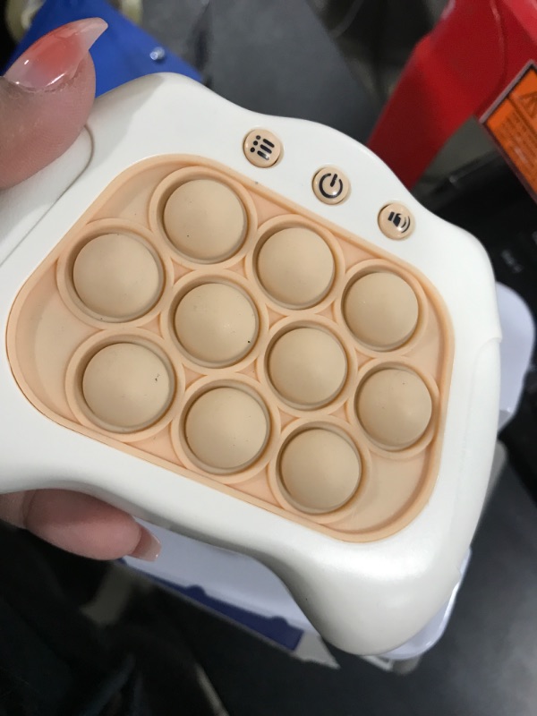 Photo 1 of AIPINQI Pop It Game Light Up Fidget Toy, Quick Push Game Console, Whack a Mole Game, Decompression Breakthrough Puzzle Pop Game Machine, Multiple Game Modes Toy for 3+ Years White