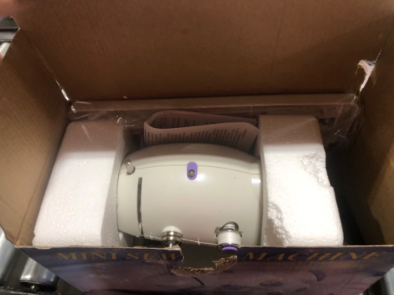 Photo 1 of Portable Sewing Machine with Extension Table and Light,Mini Handheld Sewing Machine with Upgraded,Two Threads Double Speed Double Switches,Easy to Use for Kids,Beginners and DIY ABS3