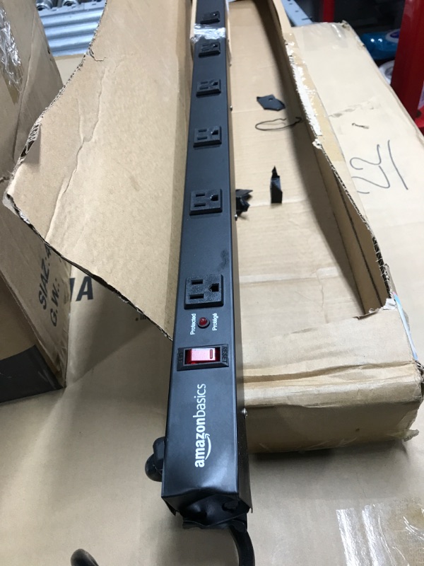 Photo 2 of Amazon Basics Heavy Duty Metal Surge Protector Power Strip with Mounting Brackets - 12-Outlet, 600-Joule (15A On/Off Circuit Breaker) 12 Outlet Power Strip