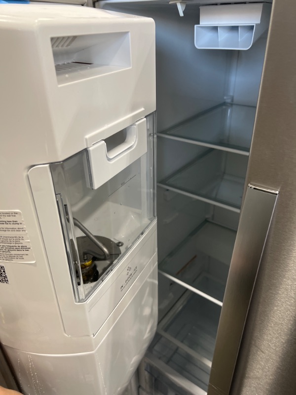 Photo 4 of Whirlpool 28.4-cu ft Side-by-Side Refrigerator with Ice Maker (Fingerprint Resistant Stainless Steel)