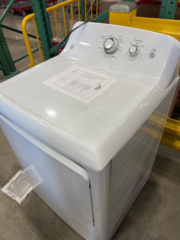 Photo 2 of GE 7.2-cu ft Reversible Side Swing Door Gas Dryer (White)