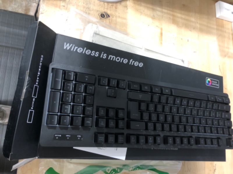 Photo 2 of Wireless RGB Gaming Keyboard and Mouse - Rechargeable RGB Backlit Keyboard Mouse Long Battery Life,Mechanical Feel Gaming Keyboard with 7 Color Wireless Gaming Mouse for PC Game and Work