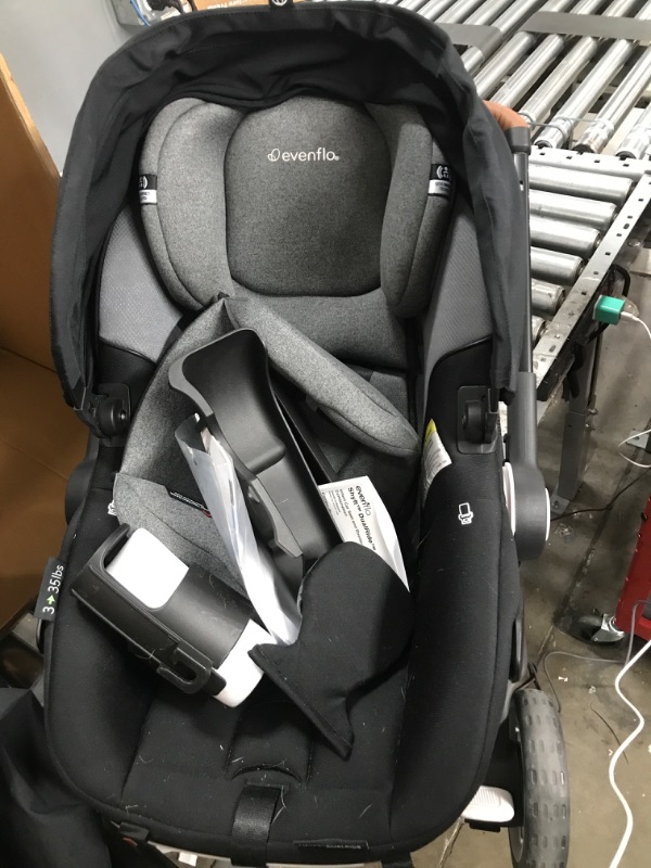 Photo 3 of Evenflo Gold Shyft DualRide Infant Car Seat and Stroller Combo with Carryall Storage (Moonstone Gray) Gold Shyft DualRide Moonstone Gray