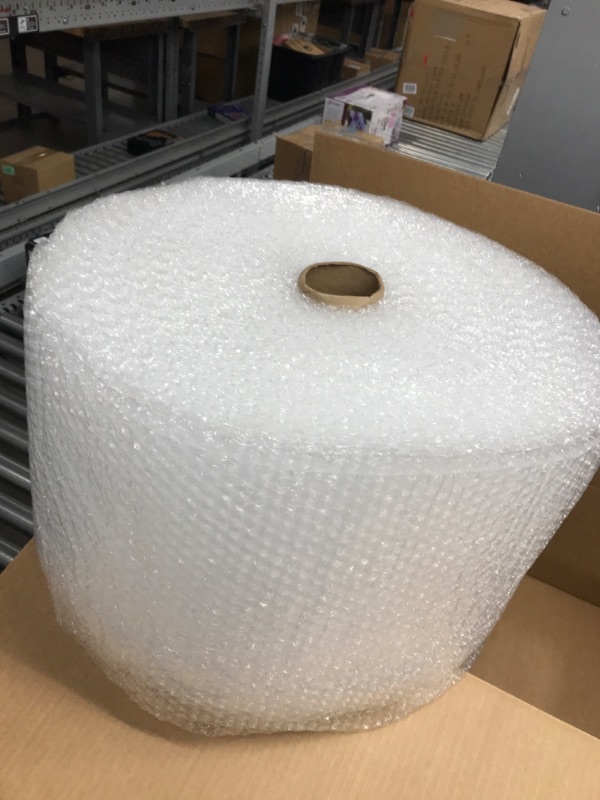 Photo 2 of Amazon Basics Perforated Bubble Cushioning Wrap - Small 3/16", 12-Inch x 175-Foot Long Roll